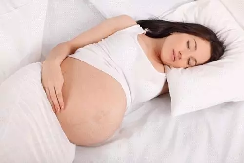 Se i en dröm om en gravid kvinna med en mage - vad betyder det? 5754_2