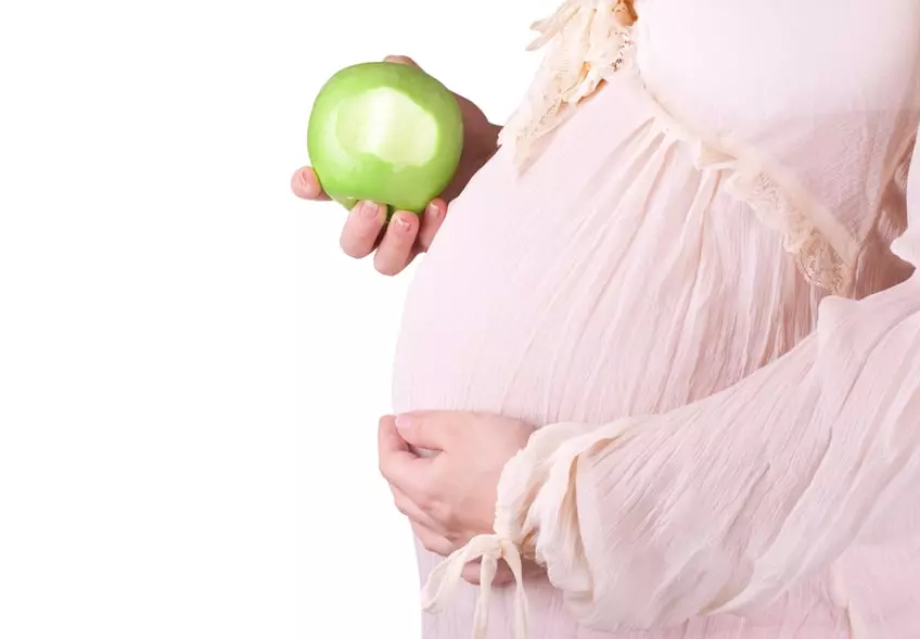 Gravid med ett äpple